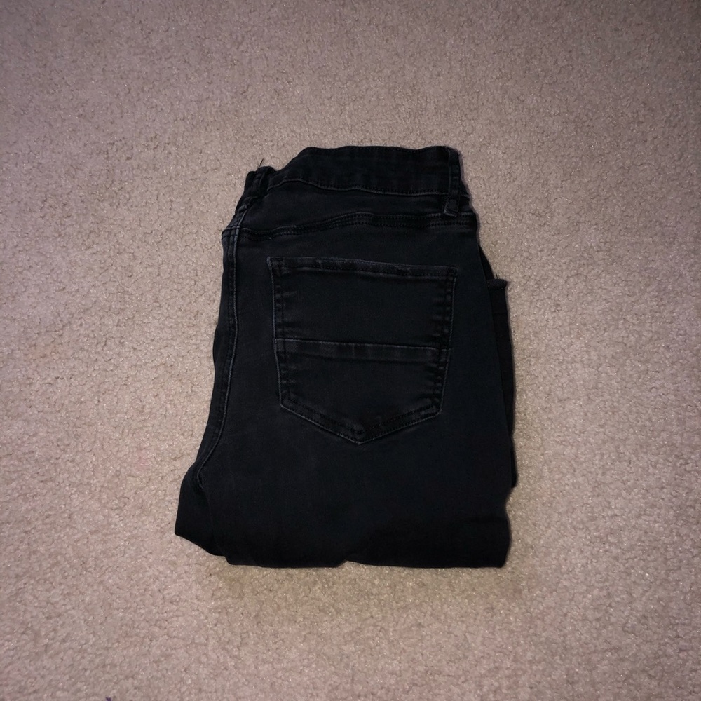 black ripped jeans